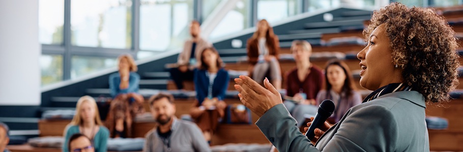 An inspiring keynote speaker at a teacher conference.