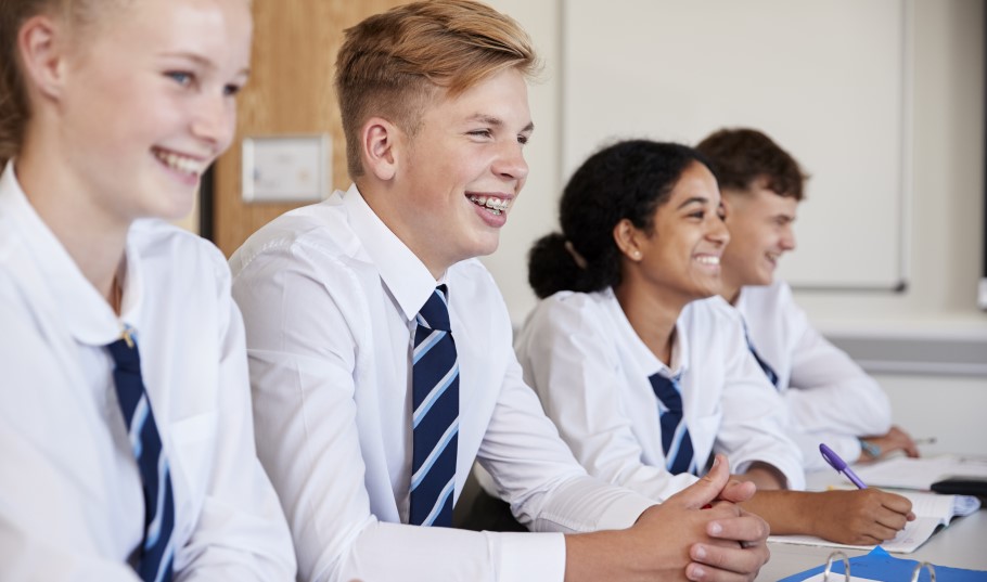 Students in a classroom listening to a university personal statement talk