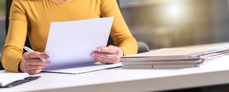 Image of a teacher completing Uni Connect paperwork