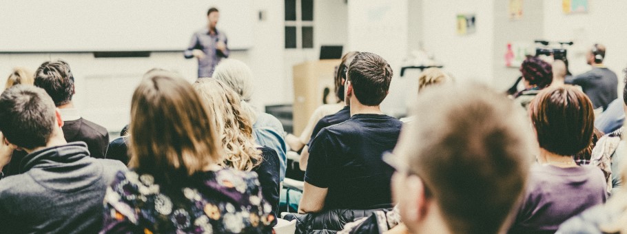 A university speaker providing a talk at a university exhibition