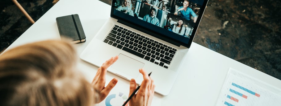 Image of a parent attending an online university webinar