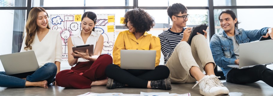 Image of a group of students chatting at a university